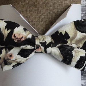 Pre tied or self tie bow tie, black and white cows