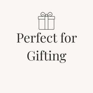 May include: A graphic illustration featuring a black line drawing of a square gift box with a bow on top, positioned above the black text "Perfect for Gifting" centered on a light cream-colored background.