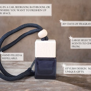 May include: A square dark glass bottle with a light wood cap and a black cord for hanging. Text on the image includes: HANG IN A CAR, BEDROOM, BATHROOM, OR ANYWHERE YOU WANT TO FRESHEN UP YOUR SPACE, 30+ DAYS OF FRAGRANCE, LARGE SELECTION OF SCENTS TO CHOOSE FROM, HAND FILLED & REFILLABLE, STYLISH DESIGN. MAKES UNIQUE GIFTS.