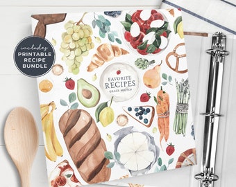May include: A white binder cover with a watercolor pattern of food items like grapes, bread, avocado, and carrots. The text "Favorite Recipes - Grace Nguyen" is in the center of the cover.