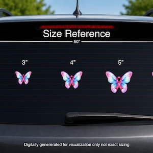 May include: Five butterfly decals with pink awareness ribbons on a car window. The butterflies are blue, pink, and purple, labeled with sizes 2, 3, 4, 5, and 6 inches. The text Size Reference is displayed above a 50-inch measurement indicator.