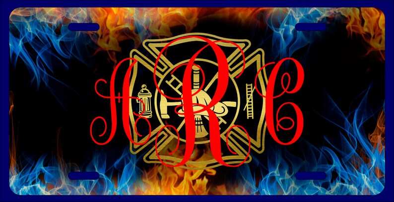 May include: A black and gold firefighter's emblem with a red monogram "R.C." on a background of blue and orange flames.