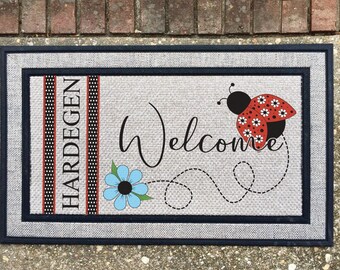 Personalized lady bug welcome mat