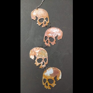 Four Skulls Metal Wind Catcher Spinner Rustic Garden Halloween Motorcyclists Bikers