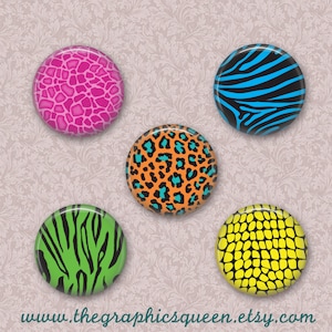 May include: Five round buttons with different animal print designs. The buttons are pink, blue, orange, green, and yellow. Each button has a different animal print design, including leopard, zebra, giraffe, snake, and cheetah.