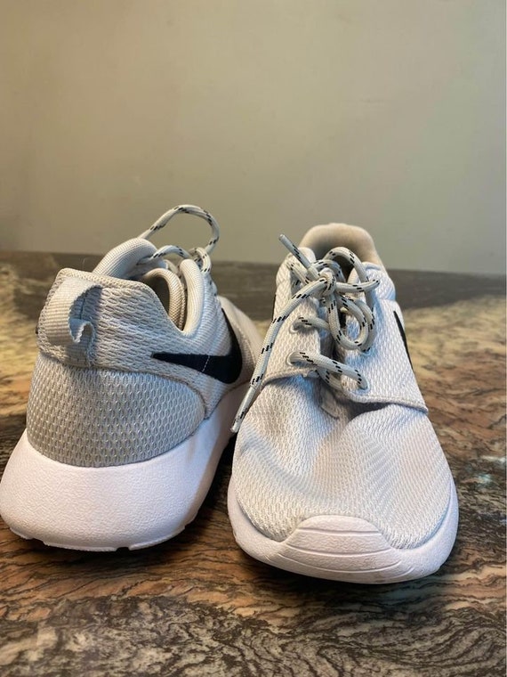 Womens size 7.5 in men's nike 2025