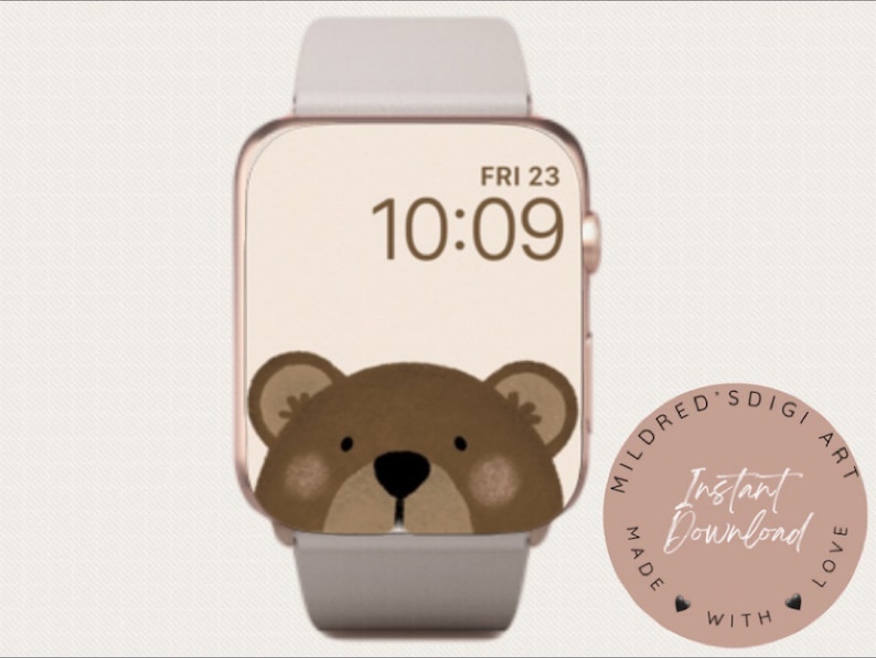 May include: A digital watch face with a brown bear peeking out from the bottom of the screen. The time is 10:09 and the date is FRI 23. The watch face is surrounded by a pink circle with the text "Mildred's Digi Art Made With Love" and "Instant Download".