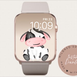 May include: A pink and gold Apple Watch face with a black and white cartoon cow illustration. The time is 10:09 and the date is FRI 23. The watch face is surrounded by a pink circle with the text "Mildred's Digi Art Made With Love" and "Instant Download".