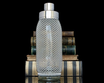 Cocktailshaker aus Glas mit Drahtgeflecht