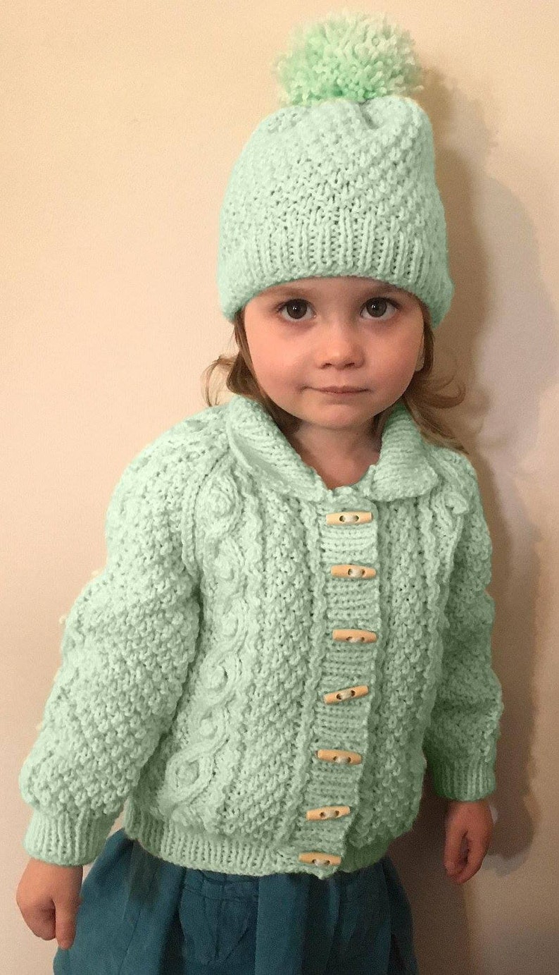 Hand knitted 12-18 months baby hat Baby blue Cable pattern.