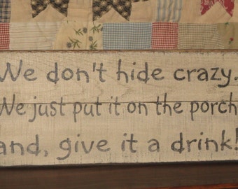 We don't hide crazy. We just put it on the porch and give it a drink!~ Upcycled Recycled Pallet wood sign