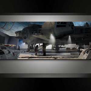 May include: A large, gray spaceship with a rounded cockpit and a long, narrow body is docked in a hangar. The spaceship is supported by several landing legs. There are two smaller, white spaceships in the foreground.