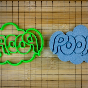 May include: Two cookie cutters in the shape of speech bubbles. The left cutter is green and says "FOOF" in a comic book style font. The right cutter is blue and says "POOF" in a comic book style font.