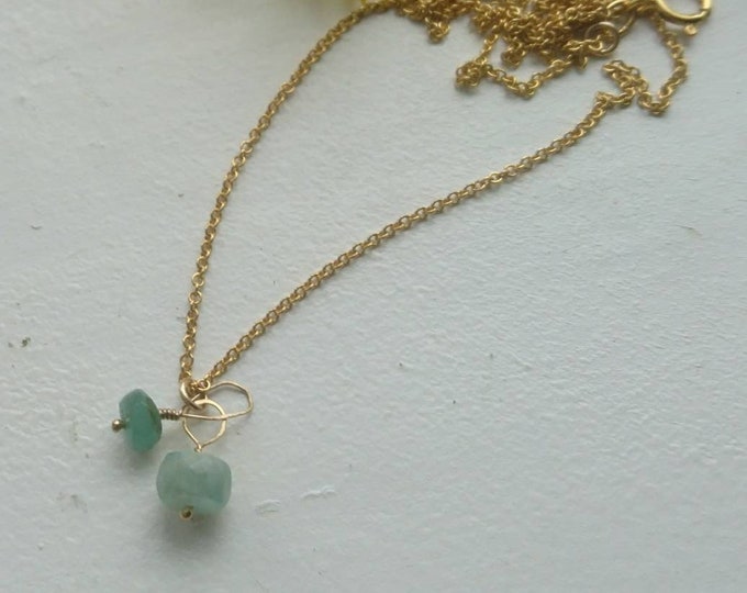 Chain with two tiny faceted raw emerald charms