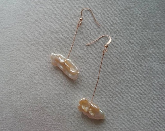 Rose gold pearl drop earrings, dangle pearl earrings, pearl jewellery, unusual earrings, unique jewellery, pearl earrings uk, rose gold drop
