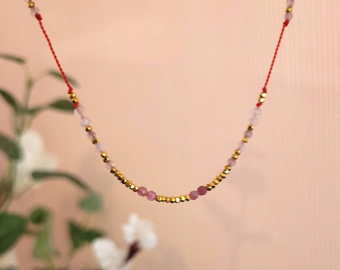 Gold beaded necklace with labradorite, pink tourmaline and moonstone on red cord