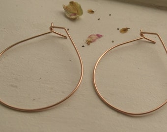 Geometric rose gold hoops