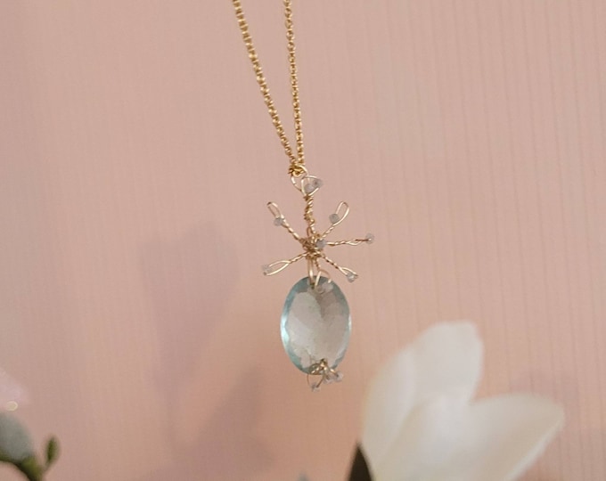 Aquamarine and diamond pendant