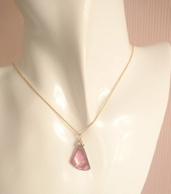 Pink tourmaline pendant with raw pink diamonds