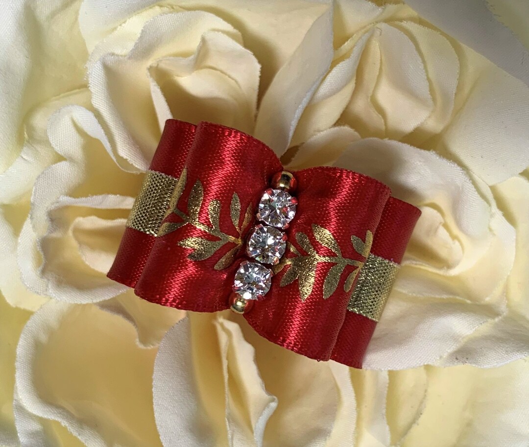 Dog Bows and More Flurry Red and Gold Topknot Dog Show Bow. Yorkie