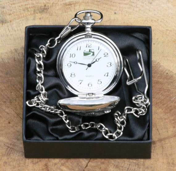 pocket watch with fishing design