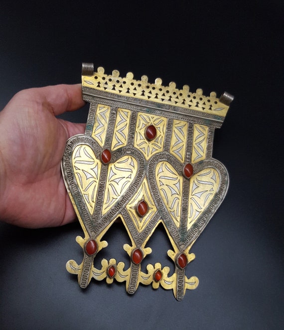 Turkmen silver pendant and glassware with pendants