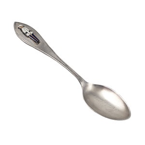 May include: Silver baby spoon with a blue and white enamel figure of a sailor on the handle. The bowl of the spoon is engraved with the word "Mommy".
