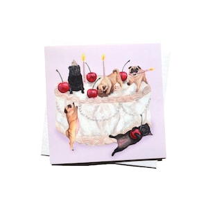 May include: A square greeting card featuring a watercolour illustration of a white frosted cake decorated with red cherries and lit candles. Five pugs in various poses are interacting with the cake, including one black pug and four fawn pugs.