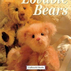 May include: A book cover titled Lovable Bears featuring two plush teddy bears with golden-brown fur. The text reads Country Craft Presents, Lovable Bears, Craftworld Books, and 28 Inspirational projects, Pattern Sheet included on an orange banner.