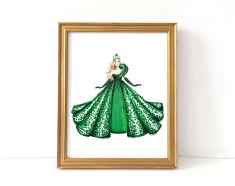 May include: A framed illustration of a woman wearing a green gown with a crown. The gown is covered in sequins and has a one-shoulder design.