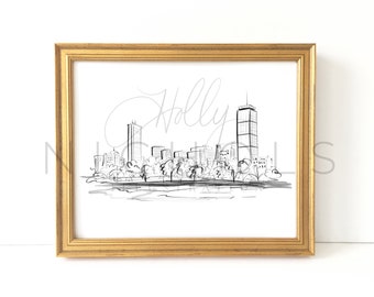 May include: A black and white line drawing of a city skyline with tall buildings and trees. The drawing is framed in a gold frame.