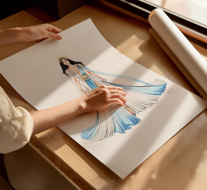 May include: A fashion illustration on white paper depicting a figure wearing a flowing, floor-length gown with a deep V-neckline, a gold sunburst headpiece, and a gold sun emblem at the waist, rendered in shades of white and blue watercolor.