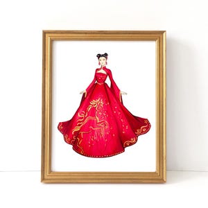 May include: A framed print featuring a watercolor illustration of a woman in a vibrant red gown. The dress has long sleeves and a flowing skirt with a gold horse design. The frame is gold.