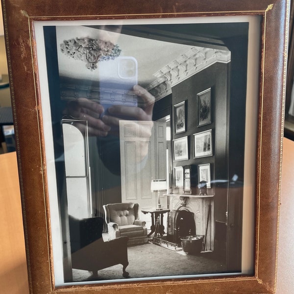 Photograph of historic interior in gilt-stamped leather easel back frame, 12 x 9.75 inches