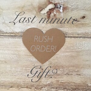 May include: A brown heart-shaped paper tag with the text "Rush Order!" on a wooden background. The text "Last minute Gift" is written above the tag.