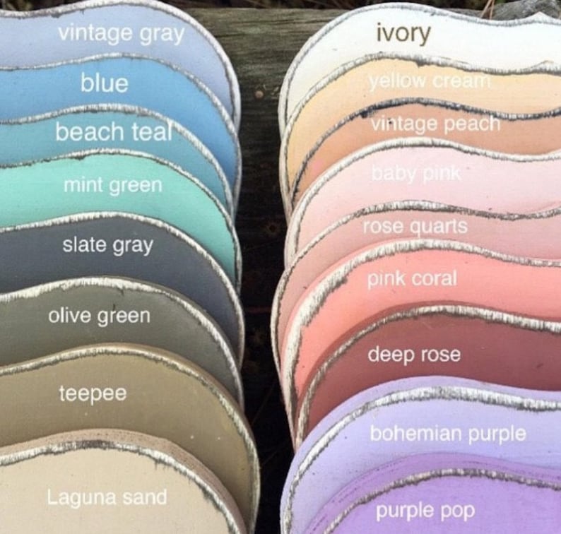 May include: A color chart of 17 paint colors, arranged in two columns. The colors are named from top to bottom: vintage gray, blue, beach teal, mint green, slate gray, olive green, teepee, Laguna sand, ivory, yellow cream, vintage peach, baby pink, rose quarts, pink coral, deep rose, bohemian purple, and purple pop.