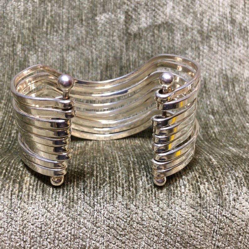 Not for Large Wrists 2 34\u201d x 2\u201d Silver Tone Steel Multi Strand Stacked Cuff Bracelet 9 Strand Avant Garde Cuff
