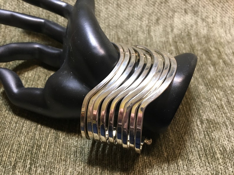 Not for Large Wrists 2 34\u201d x 2\u201d Silver Tone Steel Multi Strand Stacked Cuff Bracelet 9 Strand Avant Garde Cuff
