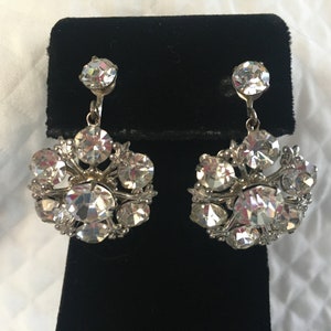 Rhinestone Dangle Screw On Earrings, Silver Tone and Clear Rhinestones Screw Back, Silver Fleur d’ lis Between Stones, 1 1/8” L, 7/8” Circle