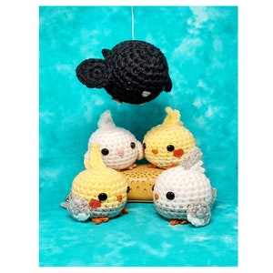 Cockatiels and crow plush- Lutino, albino, pied, white-face and a crow, handmade crochet toy