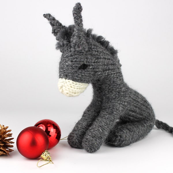 Knitting Pattern (UK terms) for Dan Donkey. A Waldorf-style toy donkey for a Christmas nativity scene or a cuddly toy. Instant pdf download.