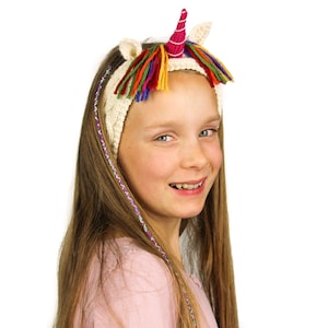 Knitting pattern (UK) for Ulysses Unicorn Headband. Quick cable headband pattern with unicorn ears, horn & mane. Stash buster. Pdf download.