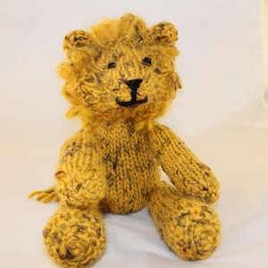 Knitting Pattern (US) for Leonard Lion - a gorgeous knitted lion.  Worked in stocking stitch with a looped mane. Knit flat or in the round.