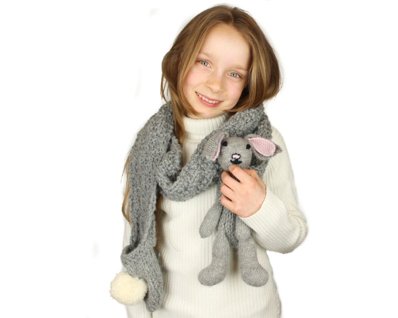 Knitting Pattern US Terms Rebecca Rabbit Scarf. Quick scarf knit in bulky yarn with bunny rabbit puppet toy and hand pockets. Easy knit. image 1