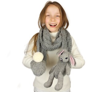 Knitting Pattern US Terms Rebecca Rabbit Scarf. Quick scarf knit in bulky yarn with bunny rabbit puppet toy and hand pockets. Easy knit. image 3
