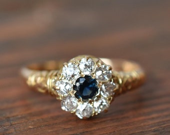 1900s 14K Antique Sapphire and Old Mine Cut Diamond Halo Ring in Yellow Gold