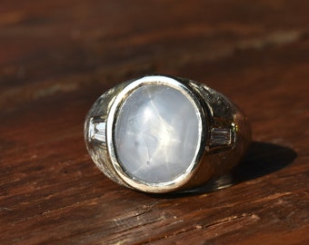 1960s Vintage Mid-Century Heavy 8 Carat Blue Grey Star Sapphire with Diamond Accents Florentine Finish Ring in 14K White Gold