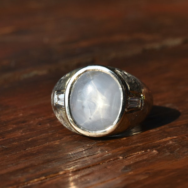 1960s Vintage Mid-Century Heavy 8 Carat Blue Grey Star Sapphire with Diamond Accents Florentine Finish Ring in 14K White Gold