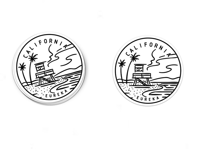 May include: Black and white sticker with a lifeguard tower, palm trees, and the text "CALIFORNIA EUREKA" in a circle.
