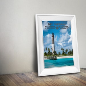 May include: A vintage-style poster featuring a lighthouse on a tropical island. The poster reads "Dry Tortugas National Park, US Department of the Interior, National Park Service".